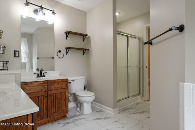 1613 E Crystal Dr, La Grange, KY 40031 - bathroom with marble look tile flooring, a shower stall, vanity, and toilet