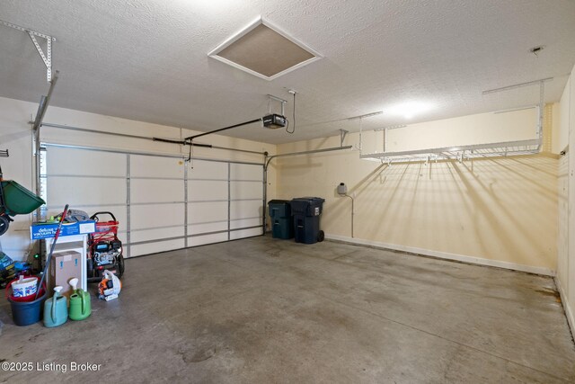1613 E Crystal Dr, La Grange, KY 40031 - garage with a garage door opener and baseboards