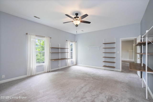 1613 E Crystal Dr, La Grange, KY 40031 - unfurnished living room with a ceiling fan, carpet floors, and baseboards