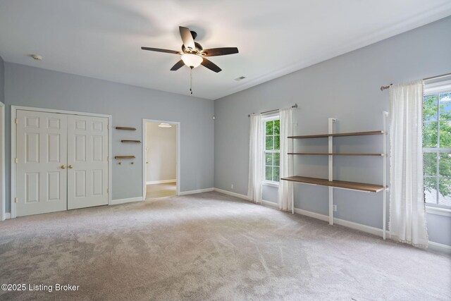 1613 E Crystal Dr, La Grange, KY 40031 - unfurnished bedroom featuring carpet flooring, baseboards, a ceiling fan, and a closet