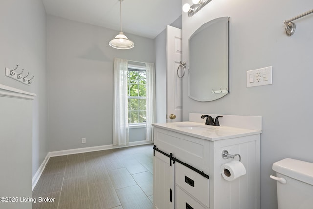 1613 E Crystal Dr, La Grange, KY 40031 - half bathroom with toilet, vanity, and baseboards
