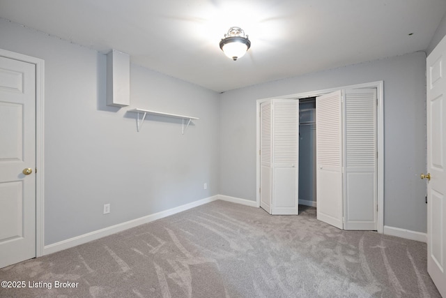 1613 E Crystal Dr, La Grange, KY 40031 - unfurnished bedroom featuring carpet floors, a closet, and baseboards