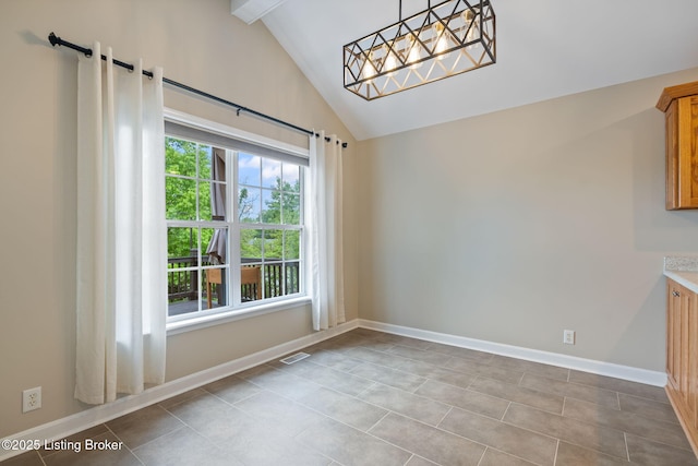 1613 E Crystal Dr, La Grange, KY 40031 - unfurnished dining area featuring baseboards, tile patterned floors, and a barn door