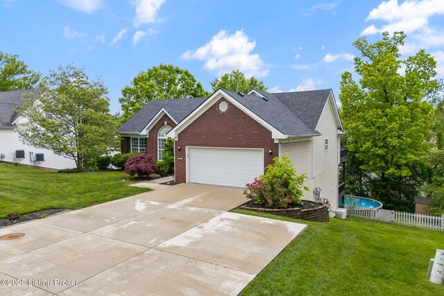 1613 E Crystal Dr, La Grange, KY 40031 - view of front of house with brick siding, driveway, an attached garage, and roof with shingles