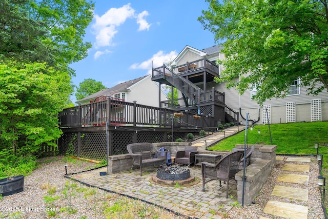 1613 E Crystal Dr, La Grange, KY 40031 - view of grassy yard with a fire pit, stairs, a wooden deck, and a patio