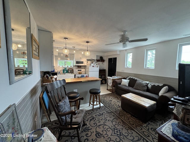 3031 Beech Grove Rd, Lebanon Junction, KY 40150 - living area with plenty of natural light and a ceiling fan