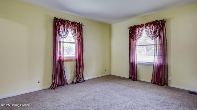 4011 Crawford Ave, Louisville, KY 40218 - carpeted empty room with healthy amount of natural light