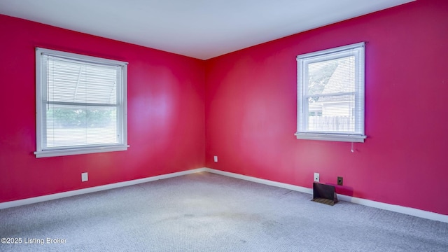 4011 Crawford Ave, Louisville, KY 40218 - carpeted empty room with baseboards