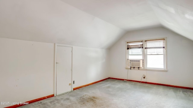 4011 Crawford Ave, Louisville, KY 40218 - additional living space with lofted ceiling, baseboards, light carpet, and cooling unit