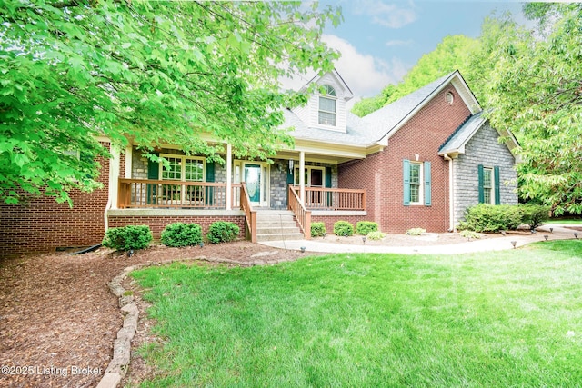 6516 Norman Ct, Crestwood, KY 40014 - view of front facade with a porch, a front lawn, and brick siding