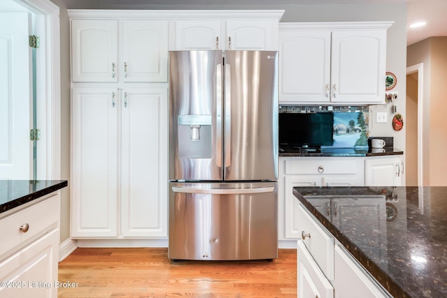 6516 Norman Ct, Crestwood, KY 40014 - kitchen with stainless steel refrigerator with ice dispenser, dark stone countertops, and white cabinets