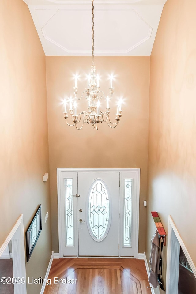 6516 Norman Ct, Crestwood, KY 40014 - entrance foyer featuring a chandelier, wood finished floors, a high ceiling, and baseboards