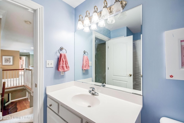 6516 Norman Ct, Crestwood, KY 40014 - bathroom with wood finished floors, toilet, and vanity