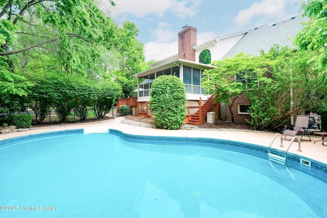 6516 Norman Ct, Crestwood, KY 40014 - view of swimming pool featuring a sunroom, stairs, fence, and a patio area
