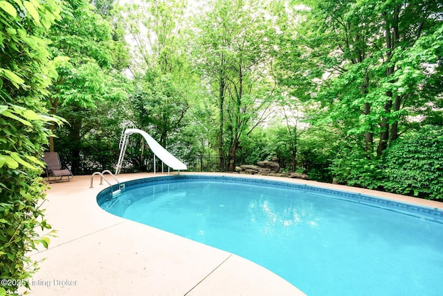 6516 Norman Ct, Crestwood, KY 40014 - outdoor pool featuring a water slide and a patio area