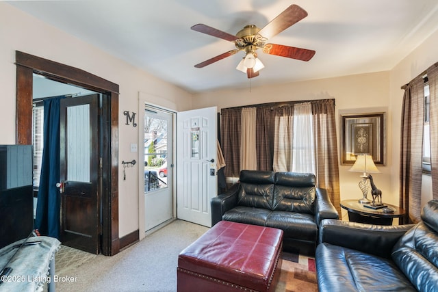 634 Ervay Ave, Louisville, KY 40217 - carpeted living room with a ceiling fan and baseboards
