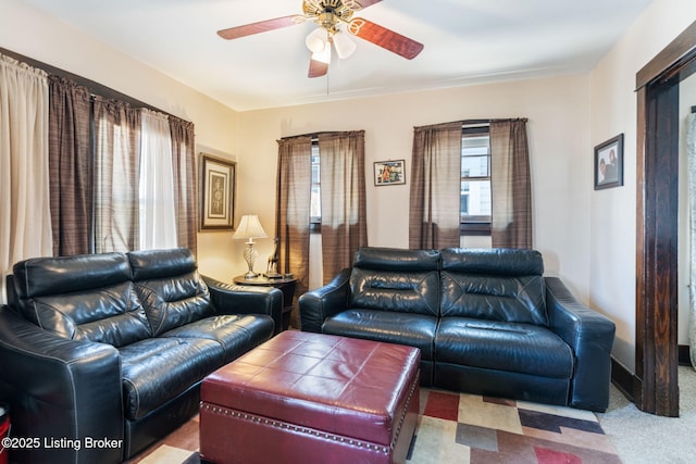 634 Ervay Ave, Louisville, KY 40217 - living room with a ceiling fan and carpet flooring