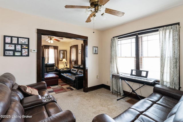 634 Ervay Ave, Louisville, KY 40217 - carpeted living area with a ceiling fan and baseboards