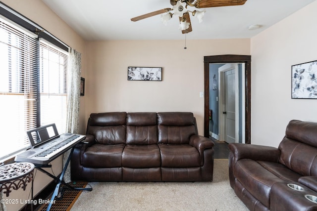 634 Ervay Ave, Louisville, KY 40217 - living area featuring a ceiling fan and carpet floors