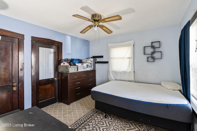 634 Ervay Ave, Louisville, KY 40217 - bedroom featuring multiple windows and ceiling fan