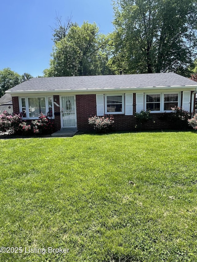 1310 Lacona Ln, Louisville, KY 40213 - single story home with brick siding and a front yard