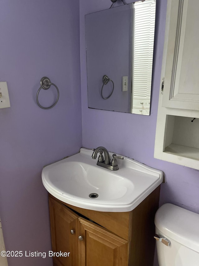 1310 Lacona Ln, Louisville, KY 40213 - half bathroom with vanity and toilet
