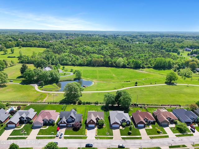 7911 Windgate Dr, Louisville, KY 40291 - aerial perspective of suburban area featuring a large body of water and a forest