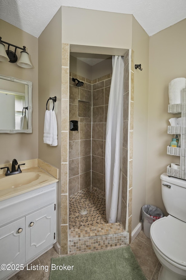 2010 Beech Grove Rd, Shepherdsville, KY 40165 - bathroom featuring toilet, a shower stall, vanity, tile patterned flooring, and a textured ceiling