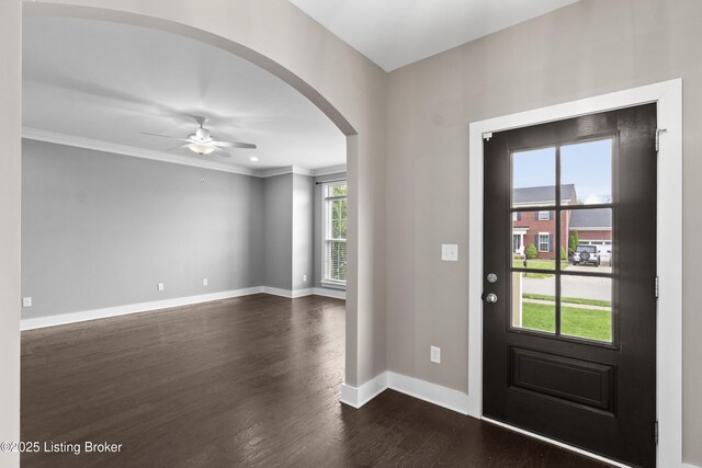 182 Washington Commons Dr, Mt Washington, KY 40047 - entrance foyer featuring arched walkways, dark wood-style floors, baseboards, ceiling fan, and ornamental molding
