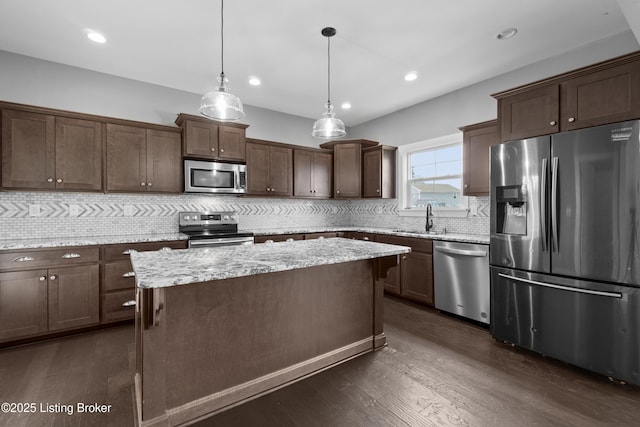 182 Washington Commons Dr, Mt Washington, KY 40047 - kitchen featuring appliances with stainless steel finishes, a sink, tasteful backsplash, dark brown cabinetry, and recessed lighting