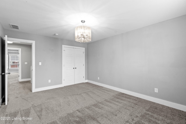 182 Washington Commons Dr, Mt Washington, KY 40047 - unfurnished bedroom with a chandelier, baseboards, and carpet flooring