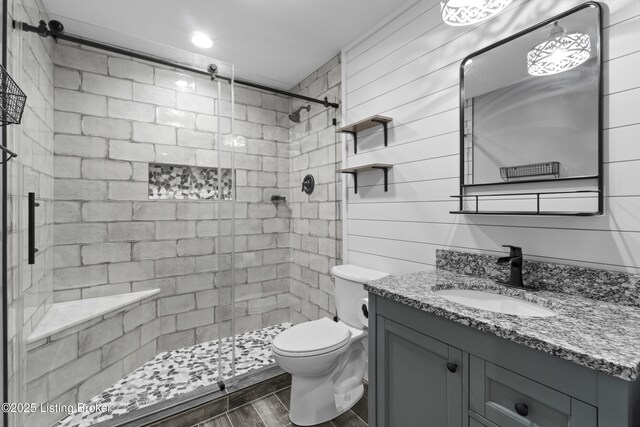 182 Washington Commons Dr, Mt Washington, KY 40047 - full bath with vanity, toilet, a shower stall, and wood finished floors