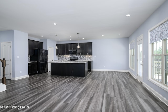 14341 Halden Ridge Way, Louisville, KY 40245 - kitchen with appliances with stainless steel finishes, dark wood-style floors, light countertops, open floor plan, and recessed lighting