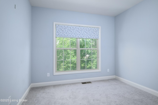 14341 Halden Ridge Way, Louisville, KY 40245 - spare room featuring plenty of natural light, carpet, and baseboards
