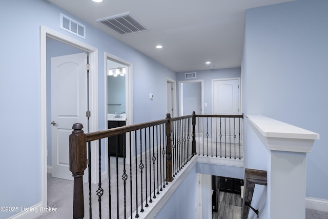 14341 Halden Ridge Way, Louisville, KY 40245 - hall featuring an upstairs landing, baseboards, and recessed lighting