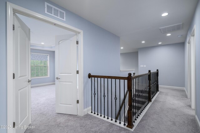 14341 Halden Ridge Way, Louisville, KY 40245 - corridor with carpet, an upstairs landing, baseboards, and recessed lighting