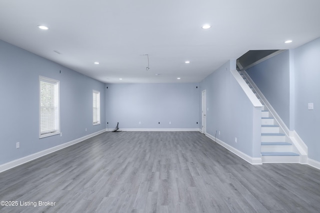 14341 Halden Ridge Way, Louisville, KY 40245 - unfurnished living room with recessed lighting, stairway, wood finished floors, and baseboards