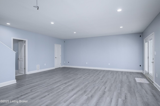 14341 Halden Ridge Way, Louisville, KY 40245 - unfurnished living room featuring wood finished floors, recessed lighting, and baseboards