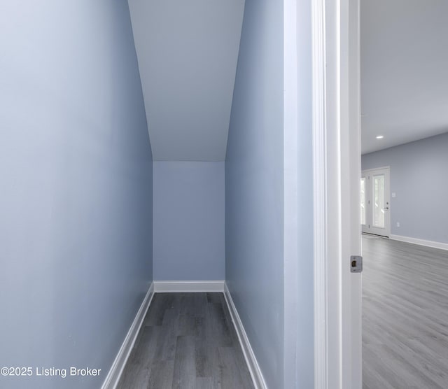 14341 Halden Ridge Way, Louisville, KY 40245 - corridor featuring wood finished floors, baseboards, and lofted ceiling