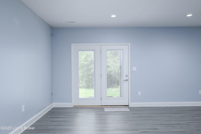 14341 Halden Ridge Way, Louisville, KY 40245 - spare room featuring wood finished floors, baseboards, and recessed lighting