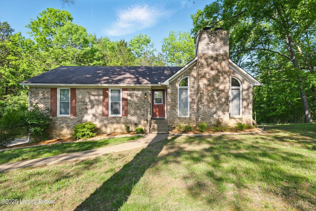 3008 Shady Trace Ct, Crestwood, KY 40014 - view of front facade featuring a chimney, brick siding, and a front lawn