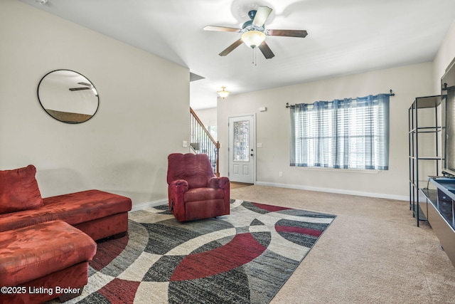 218 Sangria Dr, Vine Grove, KY 40175 - carpeted living area featuring ceiling fan, stairs, and baseboards