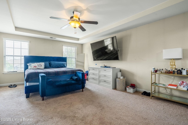 218 Sangria Dr, Vine Grove, KY 40175 - bedroom with a tray ceiling, carpet flooring, baseboards, and ceiling fan