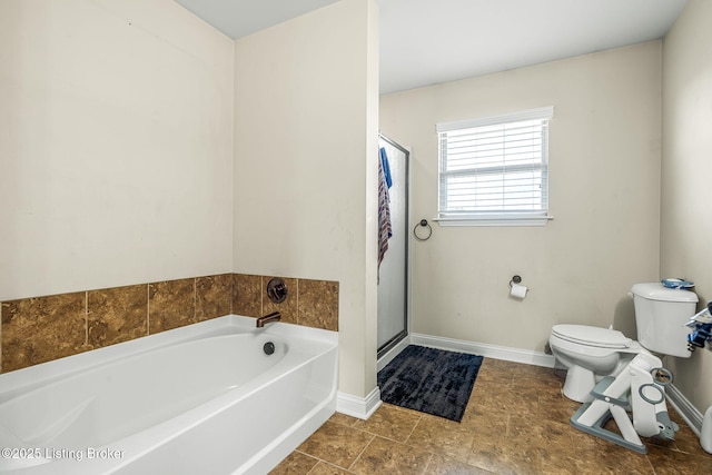 218 Sangria Dr, Vine Grove, KY 40175 - bathroom with toilet, a bath, a stall shower, and baseboards