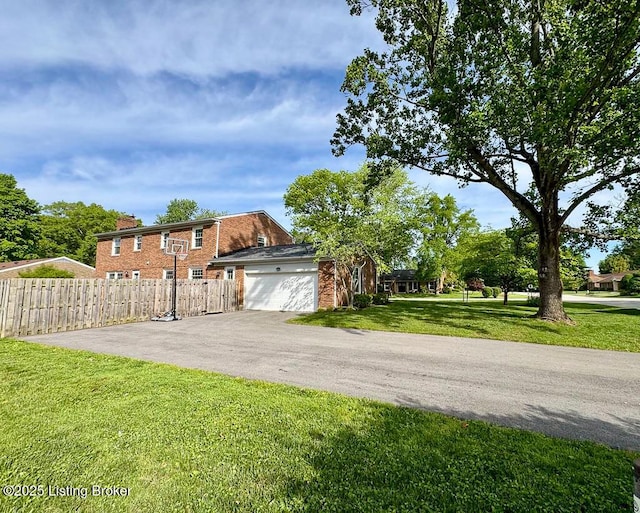 8602 Banbridge Rd, Louisville, KY 40242 - view of property exterior with asphalt driveway, brick siding, and an attached garage
