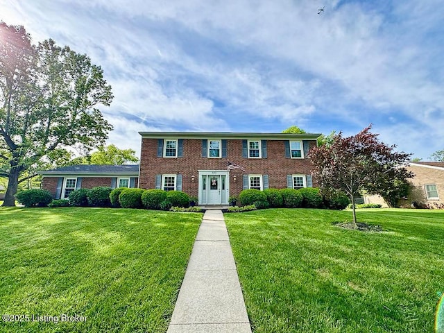8602 Banbridge Rd, Louisville, KY 40242 - colonial house with a front lawn and brick siding