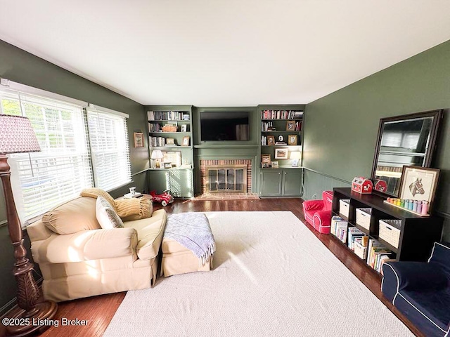 8602 Banbridge Rd, Louisville, KY 40242 - living room featuring dark wood-type flooring and a fireplace