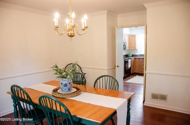 8602 Banbridge Rd, Louisville, KY 40242 - dining space with a chandelier, crown molding, and dark wood-style flooring