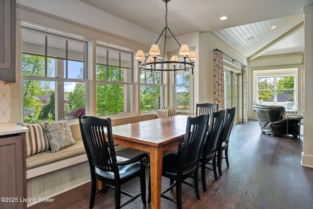 dining room with a chandelier, vaulted ceiling, recessed lighting, dark wood-type flooring, and wood ceiling