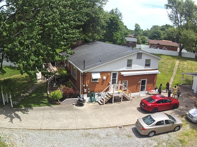 7702 Edna M Rd, Louisville, KY 40258 - back of house featuring brick siding